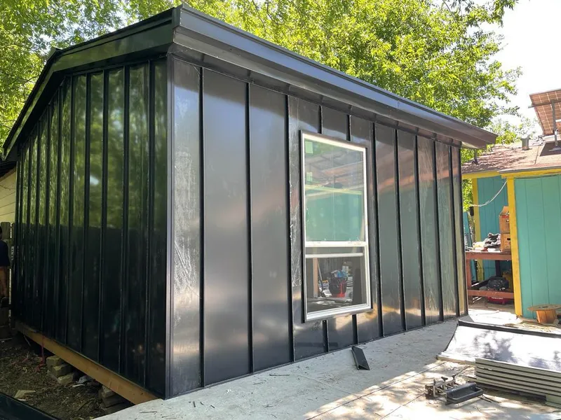 Black standing seam metal wall panels for Roof Inspection in Spring Valley